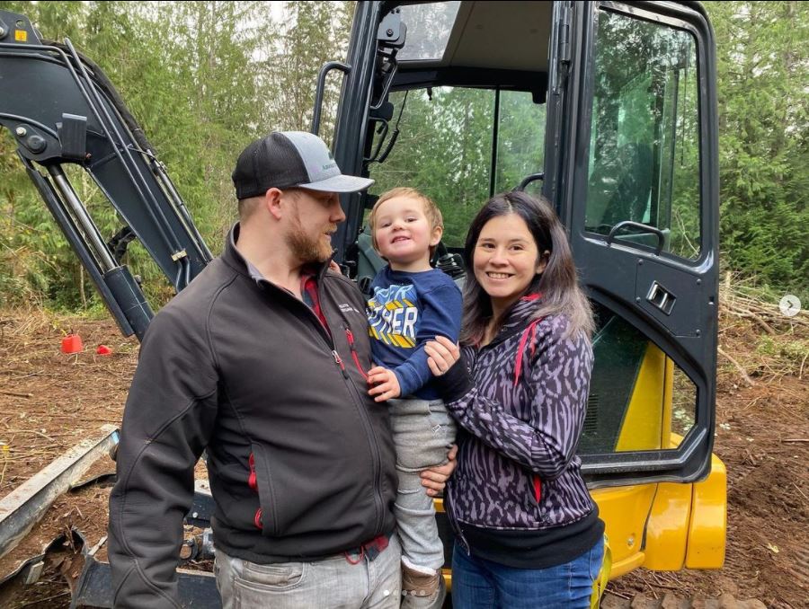 Burk Family Restoration Partners and a happy family moment new construction